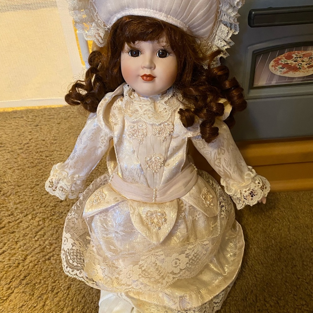 Elegant White Porcelain Doll with Brown Hair